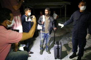 [Migrante sendo recebido no cais de São José de Ribamar, MA - Governo do Estado do Maranhão/ Folha de São Paulo